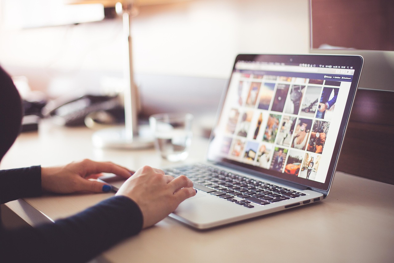 Computer, desk, typing — Refer & Earn: How to Invite Friends Using Jeetbuzz App